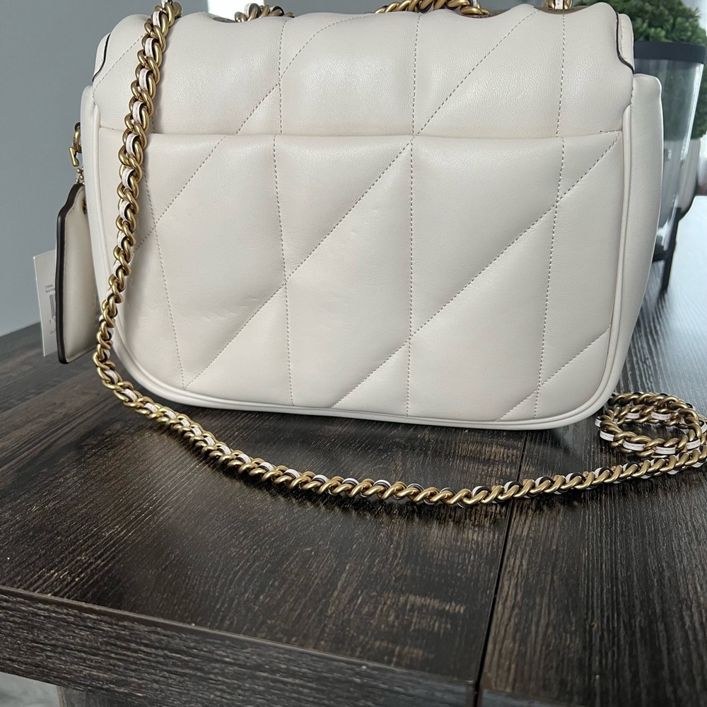 NWT Coach Madison Quilted Bag

Length: 9.25"
Height: 6.75"
Width: 3.25" - Picture 4 of 9